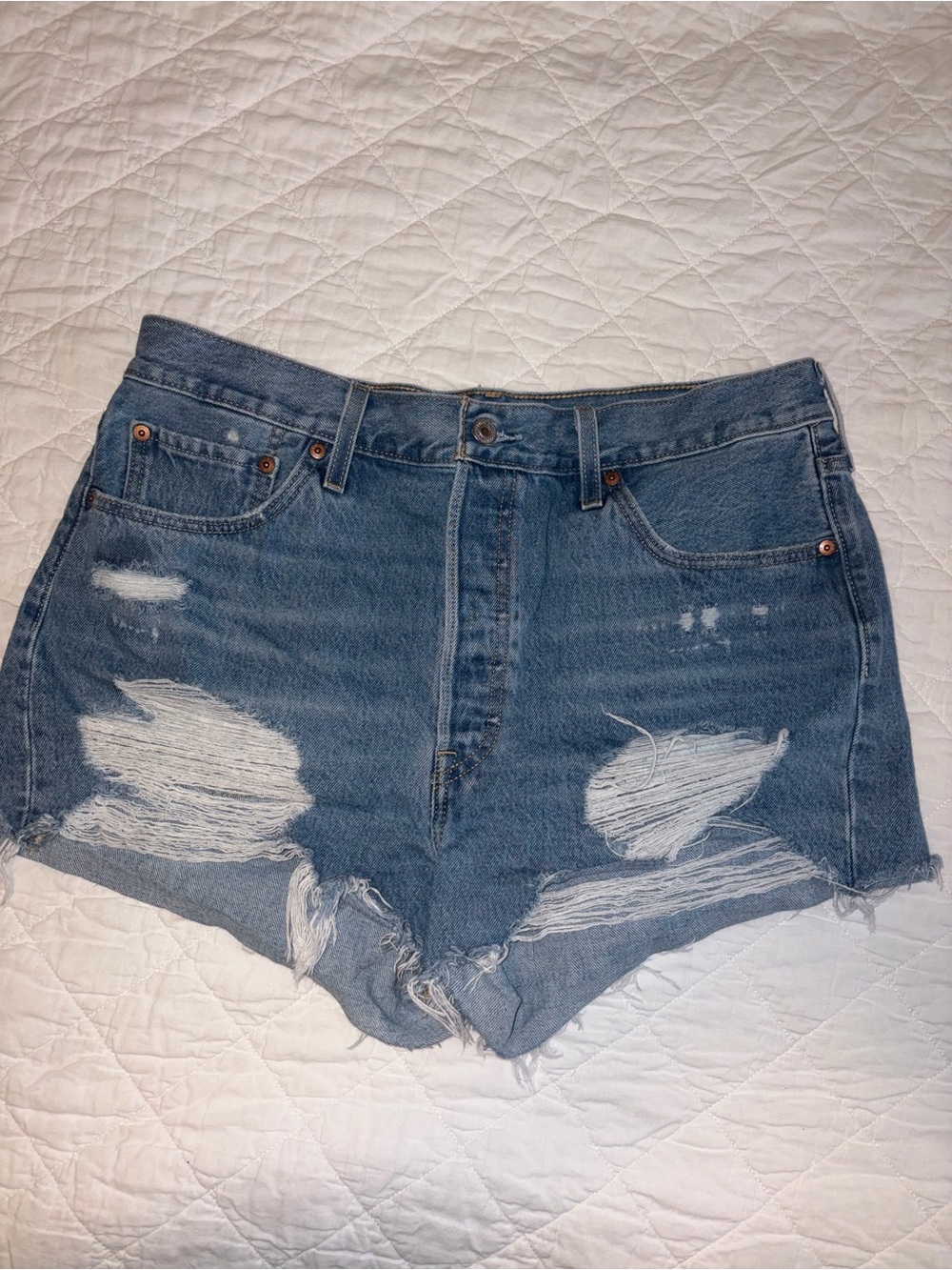 Distressed High-Rise Denim Shorts in Faded Blue